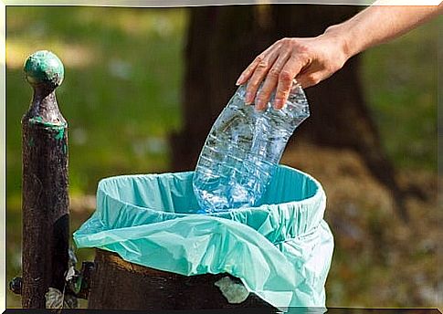 woman throwing plastic