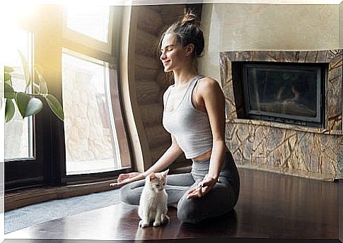 Woman doing yoga at home.