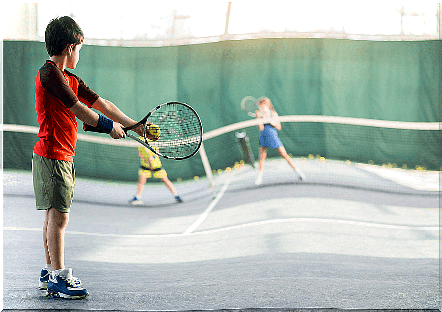 Children playing tennis