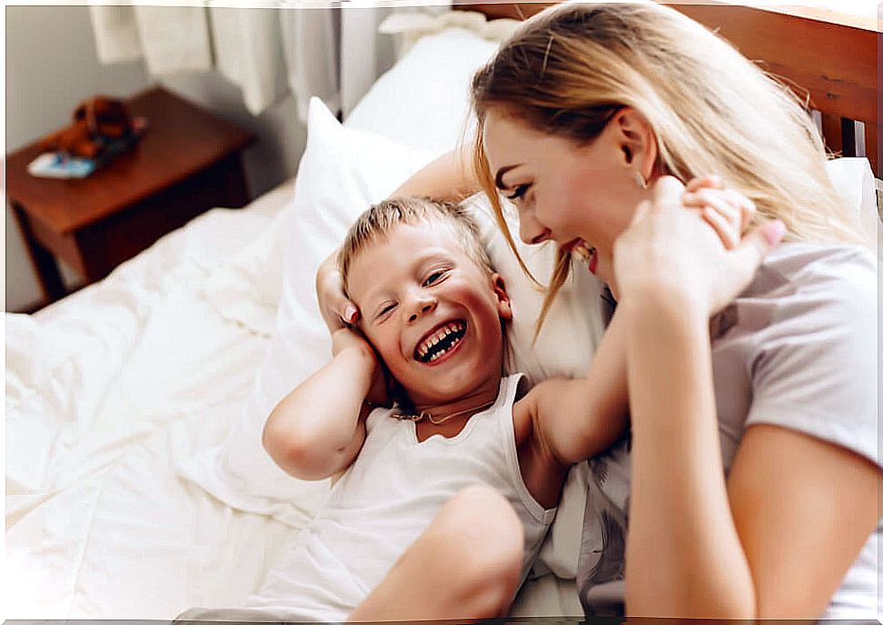 Laughter of mother and son.