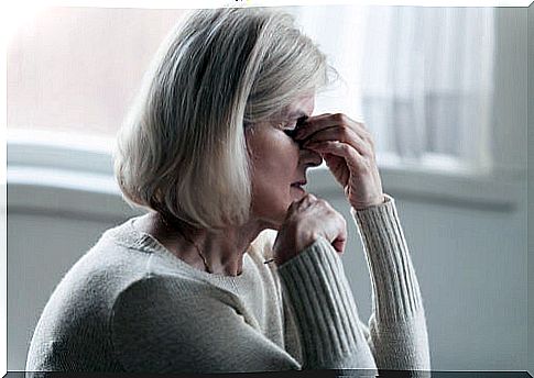 Older woman tired from iron deficiency anemia.